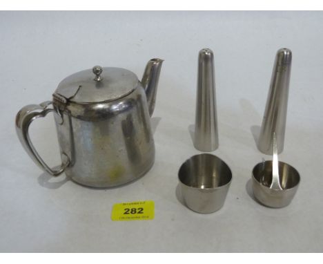 An Old Hall teapot, salt and pepper, two mustards and a spoon