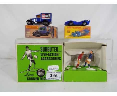 A Subbuteo live action corner kickers set in original box, ref C131, box VG and items E and two boxed miniature matchbox vehi