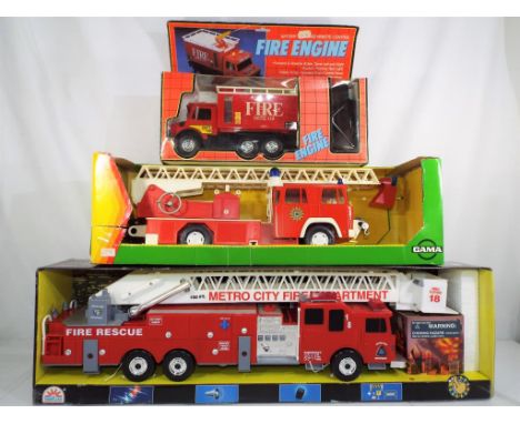 Three boxed fire engines comprising Supertoys remote control fire engine ref. 881W, Gamma Spielzeuz ladder fire engine ref 36