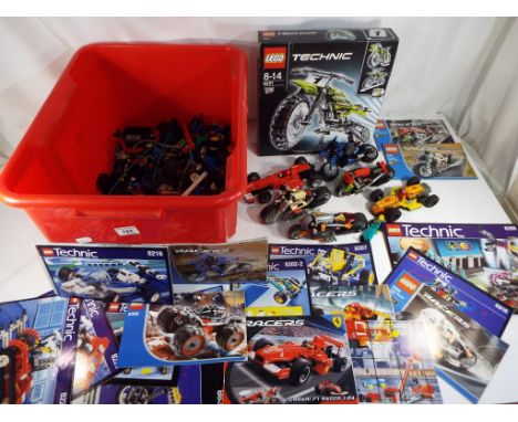 Lego - a box containing a quantity of Lego and Lego Technic to include a box set No. 8291, catalogues to include model Nos. 8