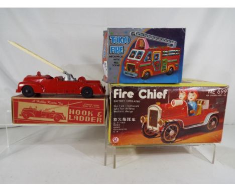 Lot to include a Hubley Kiddie Toy # 463 Hook & Ladder fire engine in original box, a Tokyo Fire tinplate, clockwork fire eng