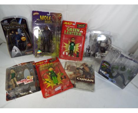 A quantity of action figures to include The Green Lantern, The Mole People by Monsters, Spawn, Savage Dragon, Canan Series 1,