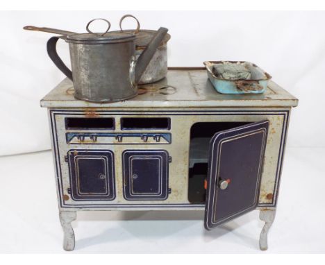 A vintage tin-plate Argo oven Made in Great Britain complete with pans, roasting tin and kettle, approximate height 17.5 cm (