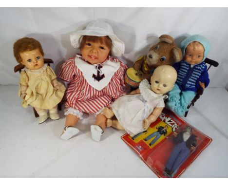 Vintage Dolls - A good mixed lot to include a Happy Days Fonzie figure by Harbert, in original blister pack, a jointed dresse