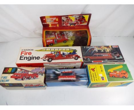 A good mixed lot of emergency service and fire trucks to include a Corgi fire strike 101, a Caston fire engine #PO/105, a Fir