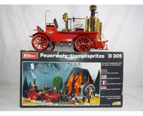 Wilesco - a steam fire engine model Feuer Wehr - Dampfspritze ref D305, with one fireman in original window packet, two hose 