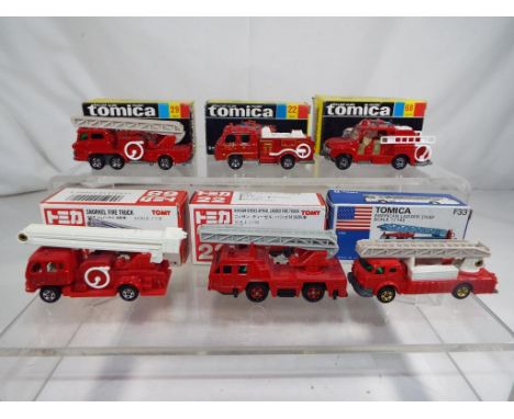 Tomica - Six Tomica diecast models of fire fighting vehicles in varying scales to include # 22 Condor Chemical Fire Truck, # 