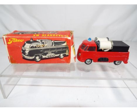 Tekno - A Tekno VW Slangevogn fire fighting vehicle # 408 with black water tank, twin hose reels, cab mounted blue light and 