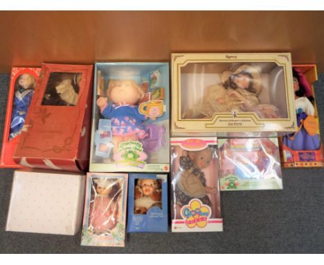 Dolls - ten boxed dolls to include porcelain dressed dolls, Disney, Cabbage Patch Kids and similar, all in original packaging