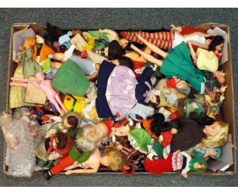 Dolls - In excess of 100 vintage dolls with international costumes to include some vintage celluloid dolls. This lot MUST be 