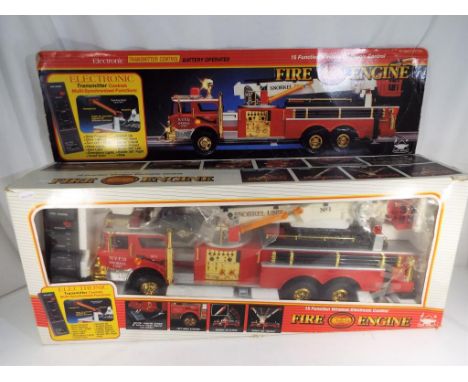 An electronic, 15 function wireless electronic controlled Fire Engine, appears exc+ in original window box (the box with some