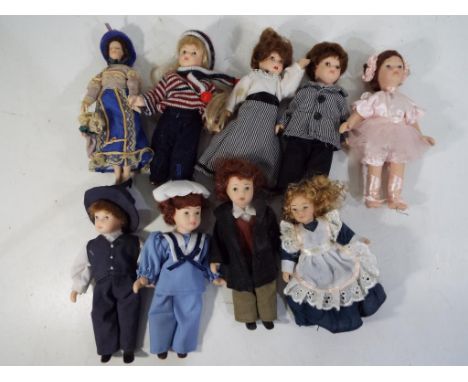 Ceramic Miniature Dolls - Nine good quality ceramic hand painted dressed miniature dolls / doll's house family. This lot MUST