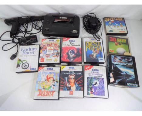 Sega - an unboxed Sega Master System II games console with control pad, light phaser gun and seven games including Enduro Rac