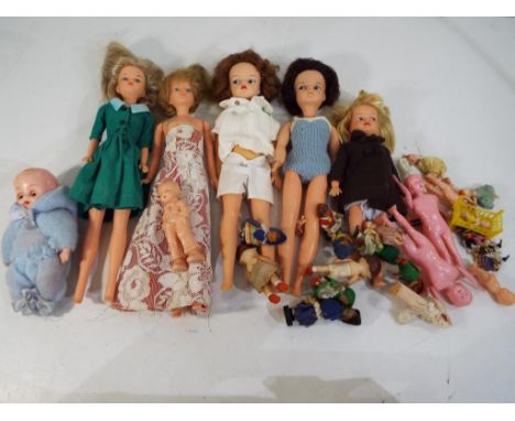 Dolls - Two vintage dressed Sindy doll's, celluloid dolls and other