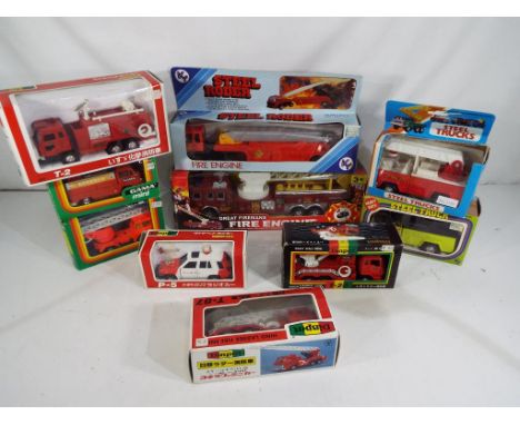 A collection of emergency service rescue vehicles predominantly diecast to include Steel Arrow DER by Ky model No. 3403, Frei