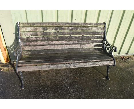 Iron and wood garden bench