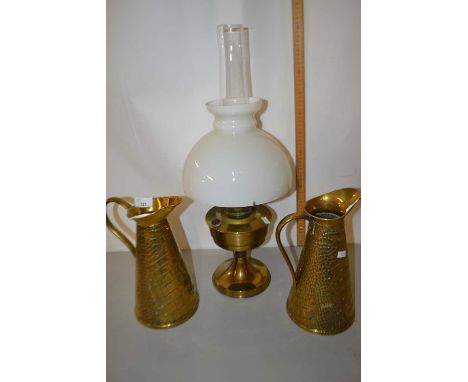Brass based oil lamp and two brass snake skin effect jugs