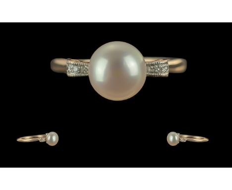 Ladies 14ct Gold Pearl and Diamond Set Ring. Marked 14ct to Shank. The Large Cultured Pearls of Excellent Lustre, With Diamon