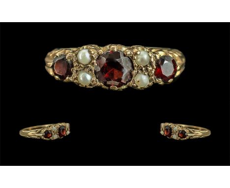 9ct Gold Antique Garnet & Pearl Dress Ring, three garnets set between four seed pearls.  Ring size N.