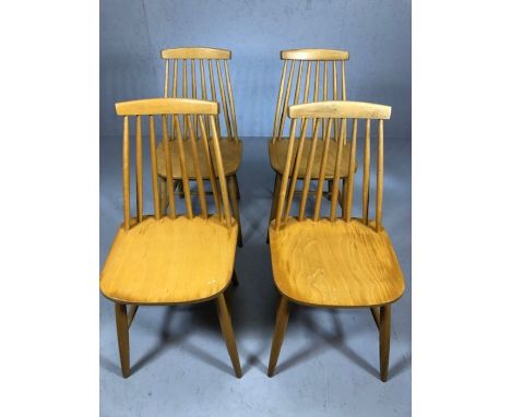 Four Mid Century stick back chairs