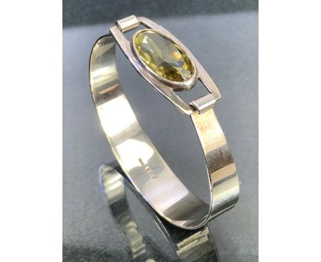 Birmingham hallmarked Silver bangle set with an Oval faceted Citrine stone 20mm x 10mm