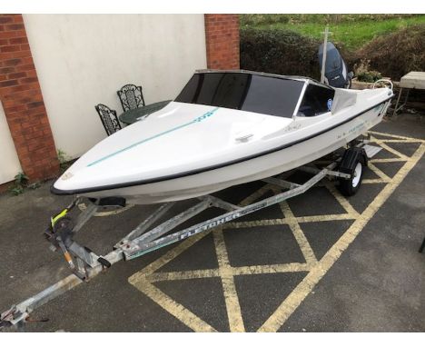 Speedboat: A Black Max Fletcher Speed boat on a road/ launch trailer with a YAMAHA 60HP outboard engine, four seats, swim lad
