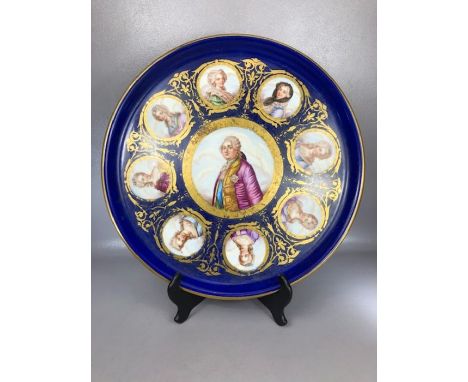A LARGE SEVRES PATTERN PORCELAIN PLAQUE painted with a portrait of King Louis XVI and eight profile portraits of Ladies of th