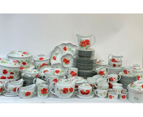 A large Royal Worchester Poppies dinner service comprising, a nut dish (l-34cm) , four serving dishes (w- 29cm), thirteen pla