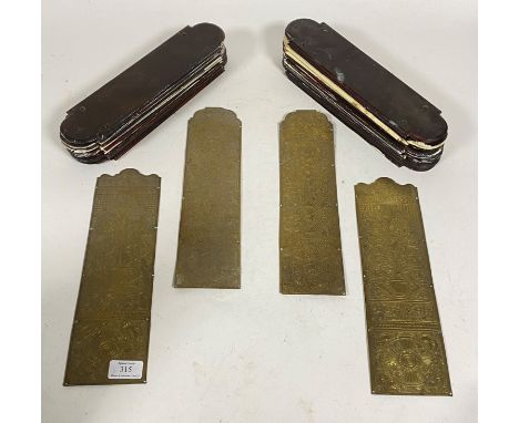 Two pairs of Edwardian chased brass finger plates, each decorated with urns and floral arabesques (30cm x 9.5cm) together wit