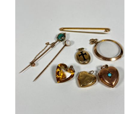 A 9ct gold heart shaped locket set turquoise, a circular open glazed pendant, a 9ct gold tie pin, a 9ct gold turquoise stick 