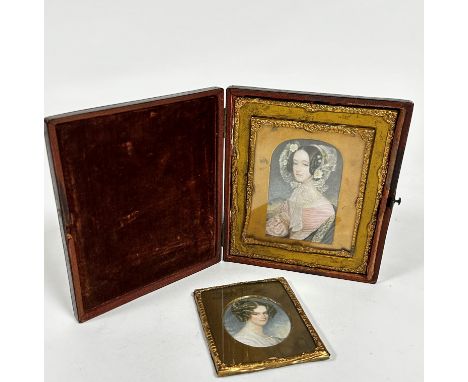 A 19thc style portrait miniature print in Morrocco style leather folding frame with gilt interior and a smaller portrait prin