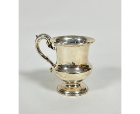 A William IV London silver christening cup with chased C scroll handle to side, of baluster form, raised on circular moulded 