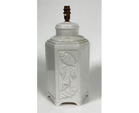 A china octagonal panelled vase lamp decorated with shell panelled alternating design, raised on bracket feet, (h: 42.5cm x 2