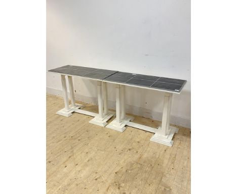 A white painted pine console table, the slate top over square moulded supports on a stepped base, in two sections, H71cm, W19