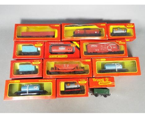 Triang Hornby - 12 boxed items of OO gauge freight rolling stock. Items include R14 Fish Van; R349 Bogie Chlorine Tank Wagon;