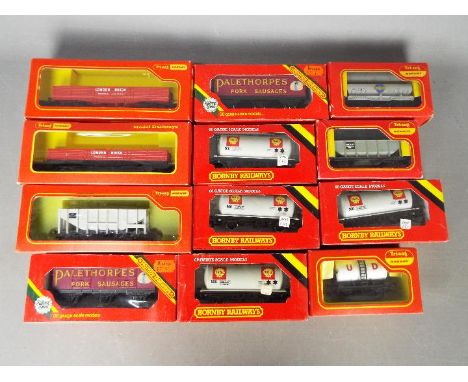 Triang Hornby - 12 boxed items of OO gauge freight rolling stock. Items include R670 6 Wheel Van 'Palethorpes'; R219 Bogie Br