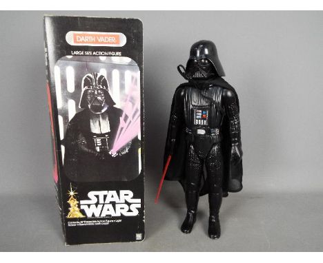 Denys Fisher, Star wars - A boxed vintage Star Wars 15" poseable Darth Vader figure with Light Sabre and Cape. The figure app