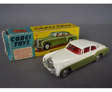 Corgi - A boxed Corgi #224 Bentley Continental Sports Saloon. The model in two-tone green, red interior, chrome trim and spun