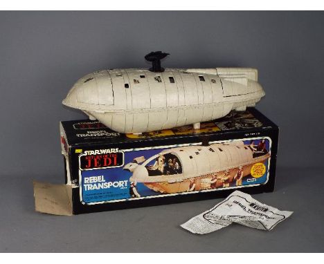 Palitoy, Star Wars - A boxed vintage Star Wars ROTJ Rebel Transport vehicle. The vehicle has play wear and is unchecked for c