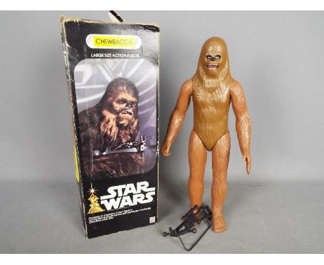 Denys Fisher, Star wars - A boxed vintage Star Wars 12" poseable Chewbacca figure. The figure appears to be in Good overall c