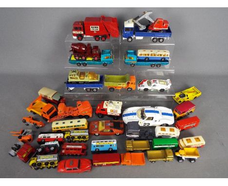 Corgi, Matchbox, Bburago, Others - A collection of unboxed diecast vehicles in various scales. Lot includes Corgi 007 Lotus E