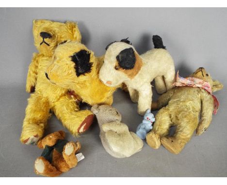 Chad Valley - A collection of predominately vintage soft toys, including bears and dogs. The lot comprises of four bears, two