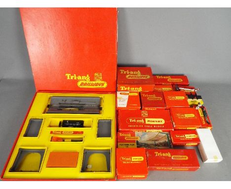 Triang Hornby - A boxed group of OO gauge model railway accessories by Triang Hornby. Lot includesR161 Operating Hopper Car S