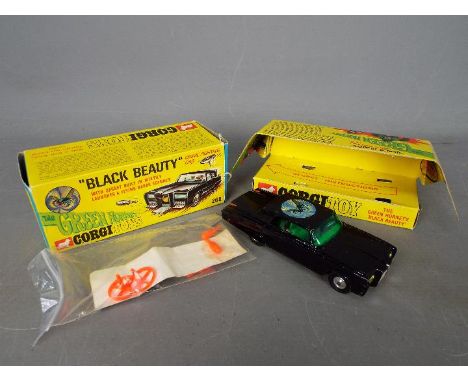 Corgi - A boxed Corgi #268 'The Green Hornet' Black Beauty. The model in black, with spun hubs, appears to be in Very Good ov