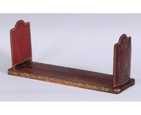 An Edwardian red morocco rounded rectangular adjustable book slide, by Dreyfous, Mount Street, London, W, their ticket, elabo
