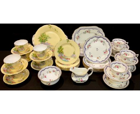 An Aynsley tea service for six, Bluebell Time pattern on yellow ground, comprising cake plate, side plates, teacups and sauce