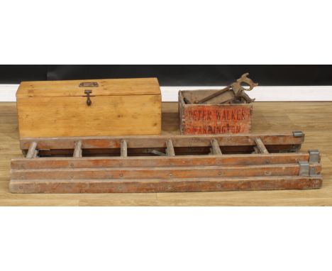 A pine tool chest; a Peter Walker, Warrington advertising crate; extending ladder; hand tools 