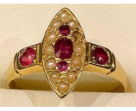 A 19th century 18ct gold ruby and seed pearl lozenge shaped ring, size K, 2g 