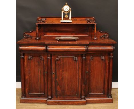 A William IV/early Victorian rosewood chiffonier or sideboard, shaped superstructure with rectangular shelf, the break-centre