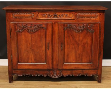 A French cherry enfilade or buffet serving sideboard, slightly oversailing top with chamfered foreangles above a single friez